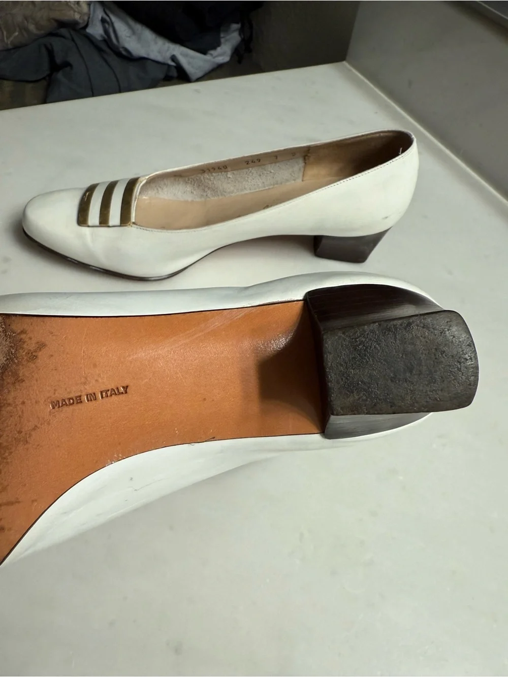 Salvatore Ferragamo White Leather Flats with Gold Striped Accent